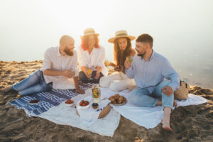 The-Little-Book-Of-Sanuk-is-THE-go-to-summer-read-for-a-dose-of-happiness-group-of-friends-having-a-pic-nic-.jpg 